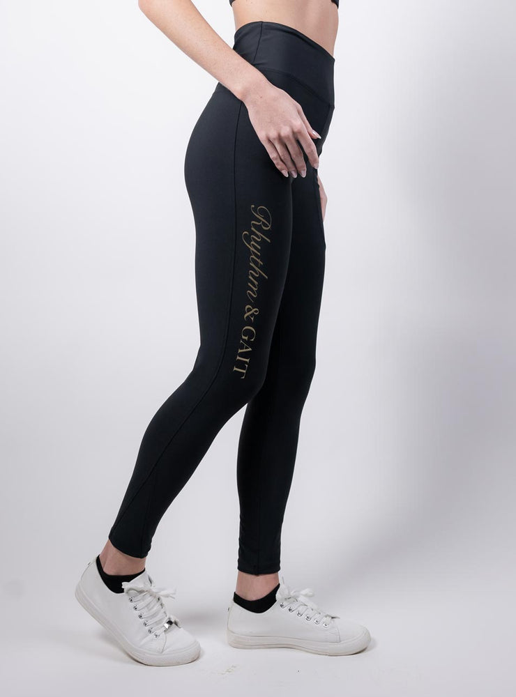 
                  
                    Black & Gold Performance riding tights
                  
                